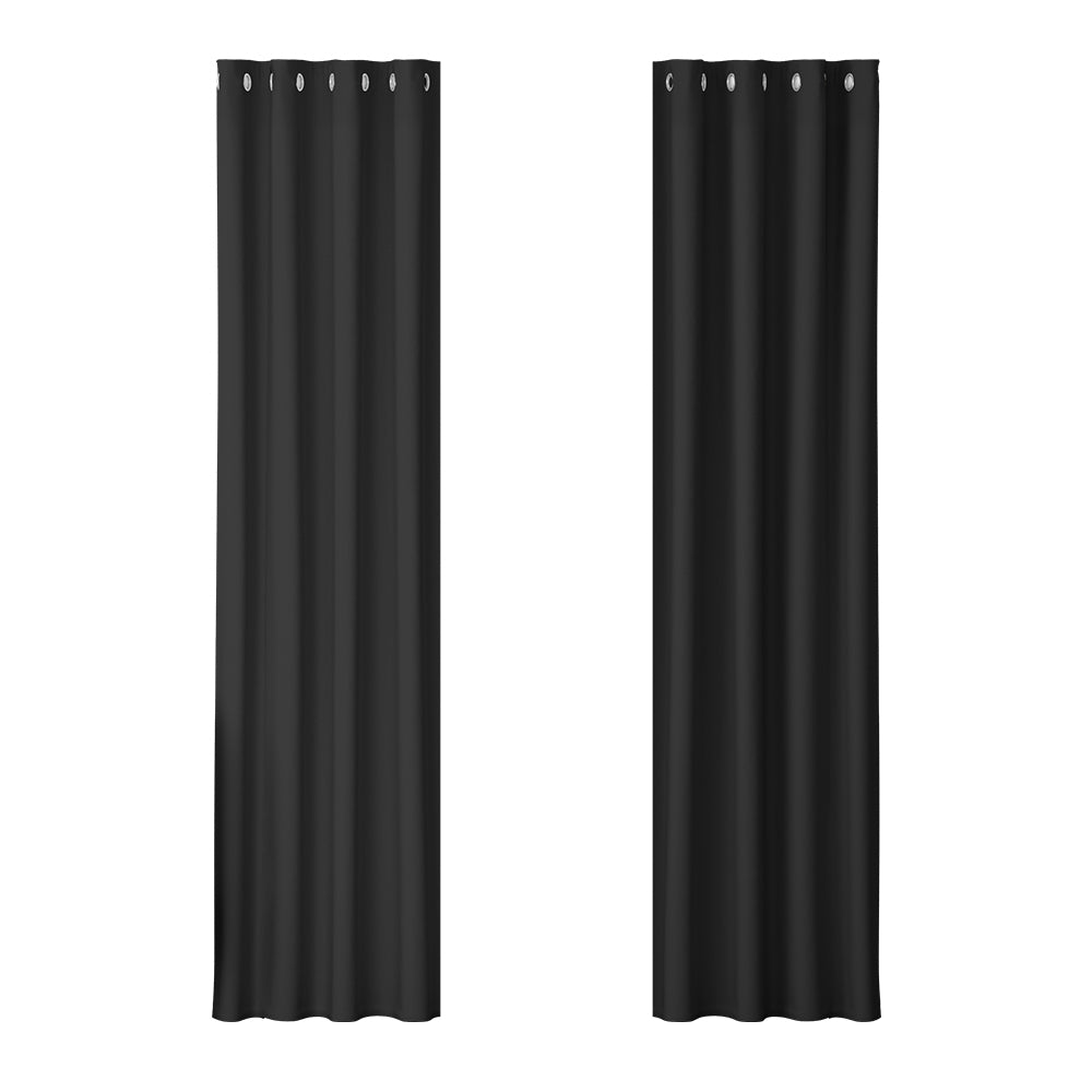 Black eyelet blockout curtain, 140 by 230 centimetres.