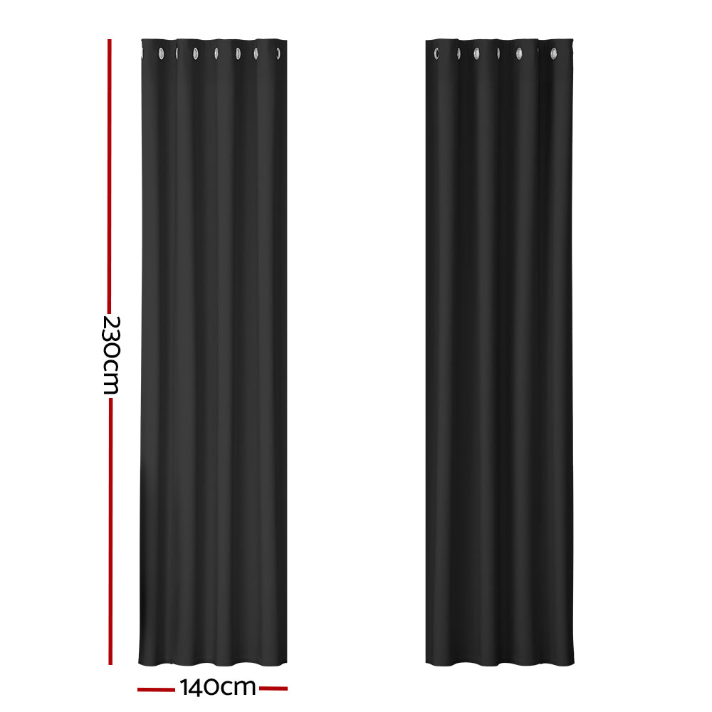 Black eyelet blockout curtain, 140 by 230 centimetres, alternative view.