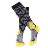 Pair of graduated compression socks, shown in use.